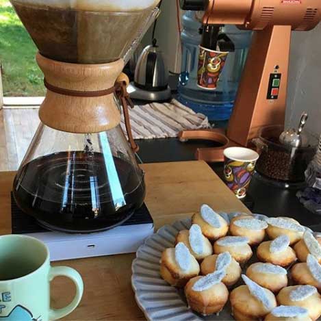 Freshly brewed coffee and mini cakes